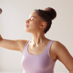 **

"A singer doing vocal warm-ups, stretching neck and shoulders, in a bright studio. Focus on relaxation and body awareness. Soft lighting, pastel colors."

**
